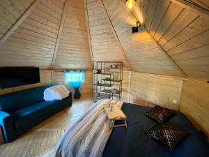 Tempat tidur dalam kamar di Alsace kota évasion & Spa la canopée