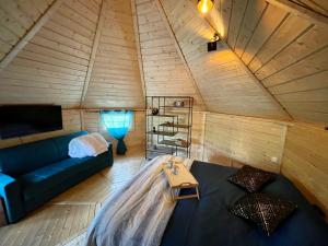 an overhead view of a living room in a tree house at Alsace kota évasion & Spa la canopée in Mollkirch