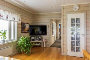 TV a/nebo společenská místnost v ubytování Majestic 3 Bedroom Villa With Sauna