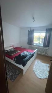 Postel nebo postele na pokoji v ubytování Wohnung am Mittellandkanal