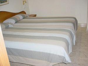 Postel nebo postele na pokoji v ubytování Hostal La Barretina