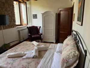 A bed or beds in a room at B&B QUINTARELLI