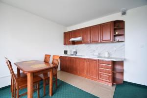Kuchyňa alebo kuchynka v ubytovaní Apartamenty Kołobrzeg Morska