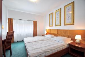 Posteľ alebo postele v izbe v ubytovaní Apartamenty Kołobrzeg Morska