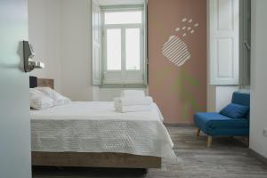 Postel nebo postele na pokoji v ubytování Leevin Guesthouse
