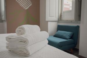 Postel nebo postele na pokoji v ubytování Leevin Guesthouse