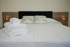 Postel nebo postele na pokoji v ubytování Leevin Guesthouse
