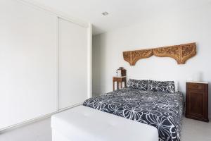 Łóżko lub łóżka w pokoju w obiekcie Luxury Frontline Poris de Abona