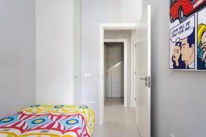 Łóżko lub łóżka w pokoju w obiekcie Luxury Frontline Poris de Abona