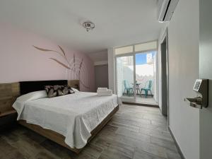 Postel nebo postele na pokoji v ubytování Leevin Guesthouse