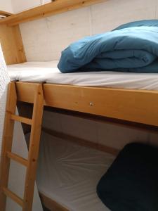 Posteľ alebo postele v izbe v ubytovaní la dryade chinaillon