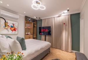 Letto o letti in una camera di The David Story Boutique