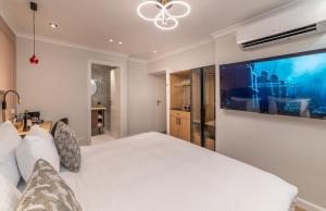 Letto o letti in una camera di The David Story Boutique