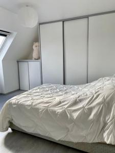 Łóżko lub łóżka w pokoju w obiekcie Vive la vie - maison de famille à Mers proche mer