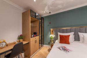 Letto o letti in una camera di The David Story Boutique