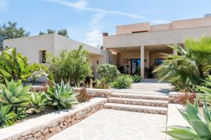 A garden outside Lavish Ibizan Villa Beautiful Gardens Villa Izarra Private Pool Wonderful Country Views San Jose