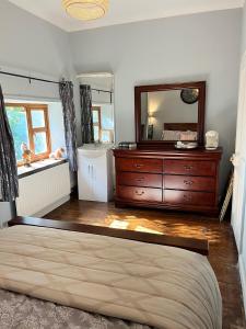 Postelja oz. postelje v sobi nastanitve Stone Lodge B&B