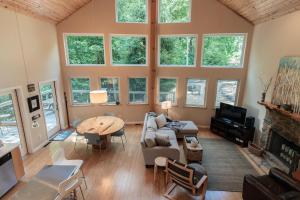 a living room with a couch and a table at Moonlight Ridge - Powder Horn Mountain in Powderhorn Mountain