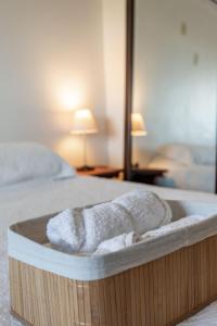 Postel nebo postele na pokoji v ubytování CONDOMÍNIO BUZIOS RESORT - PÉ NA AREIA - Casa 3 suites
