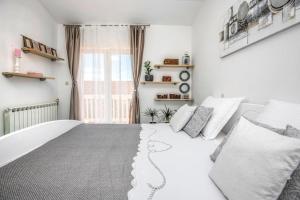 Posteľ alebo postele v izbe v ubytovaní Villa Piljak