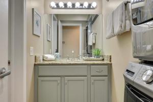 a bathroom with a sink and a mirror at Harbor Springs Retreat in Harbor Springs +14 photos