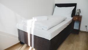 Ένα ή περισσότερα κρεβάτια σε δωμάτιο στο Hotel U Ševce