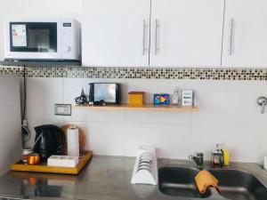 Köök või kööginurk majutusasutuses DEPARTAMENTOS ALBERDI VIEDMA