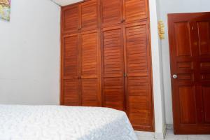 Een bed of bedden in een kamer bij Hostal Familiar Argeñal