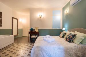 Posteľ alebo postele v izbe v ubytovaní Vintage Suite Napoli