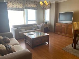 TV a/nebo společenská místnost v ubytování Bonito Apartamento con wifi y patio