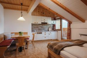 Kuchyňa alebo kuchynka v ubytovaní Oberaldoss Residence Wellness