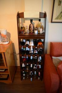 a wine rack filled with lots of wine bottles at ZeusPlace Valentina's house Elatochori in Elatochori