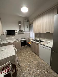 A kitchen or kitchenette at Palazzo Senesi