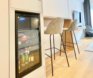 Televiisor ja/või meelelahutuskeskus majutusasutuses Bulevard Luxury Suites