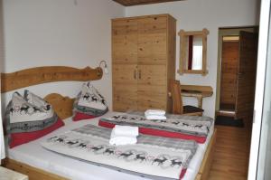 Postel nebo postele na pokoji v ubytování Haus Voithofer