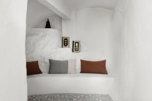Postel nebo postele na pokoji v ubytování La AMARA Lounis - en el casco antiguo de Frigiliana
