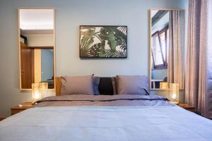 Posteľ alebo postele v izbe v ubytovaní Urban Jungle Apartment in the Citycenter
