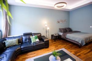 Posteľ alebo postele v izbe v ubytovaní Urban Jungle Apartment in the Citycenter