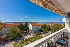 a view from the balcony of a apartment with a view at Apartments PERA in Selce