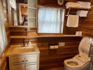 a small bathroom with a sink and a toilet at Glamping Village Leaf - Vacation STAY 65726v in Mashiki