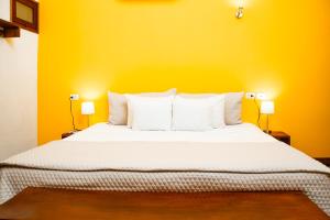 Hotel con Corazón Granada客房内的一张或多张床位
