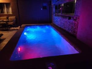 A piscina localizada em Lalck Cketi Hospedaje y Turismo ou nos arredores