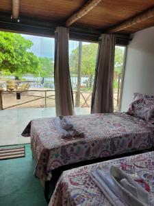 Postel nebo postele na pokoji v ubytování Bangalô Mangue Seco - Jericoacoara ce + 20 fotografií