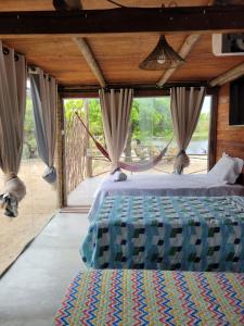 Postel nebo postele na pokoji v ubytování Bangalô Mangue Seco - Jericoacoara ce