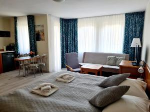 Posedenie v ubytovaní ApartamentyPrzyMorzu Wschód Słońca Olymp z basenem