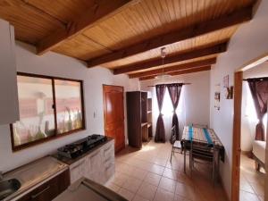 Kuchyň nebo kuchyňský kout v ubytování Lalck Cketi Hotelería y Turismo