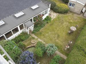 an aerial view of a house with a garden at Sundial Cottage in Norwich
