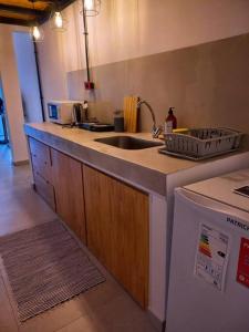A kitchen or kitchenette at TEKOHA, Alquiler Temporario en Posadas! Még 34 kép