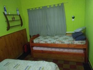 Кровать или кровати в номере Depto San Clemente del tuyu centro