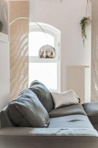 Łóżko lub łóżka w pokoju w obiekcie Spektakuläres Apartment ✩ 7. Stock ✩ kostenlose Parkgarage
